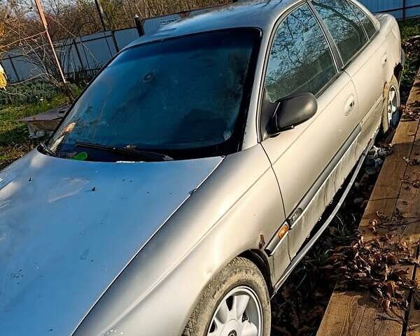 Серый Опель Омега, объемом двигателя 2 л и пробегом 400 тыс. км за 900 $, фото 1 на Automoto.ua