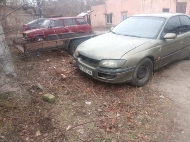 Сірий Опель Омега, об'ємом двигуна 2 л та пробігом 300 тис. км за 1500 $, фото 1 на Automoto.ua