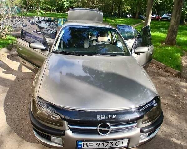 Сірий Опель Омега, об'ємом двигуна 0 л та пробігом 243 тис. км за 4500 $, фото 1 на Automoto.ua