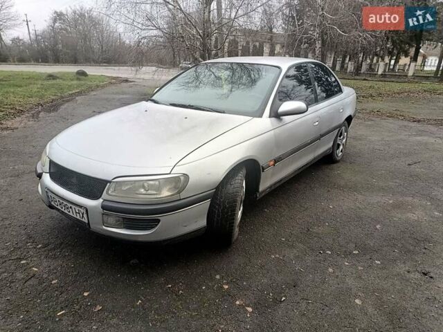 Серый Опель Омега, объемом двигателя 2.5 л и пробегом 398 тыс. км за 2400 $, фото 1 на Automoto.ua