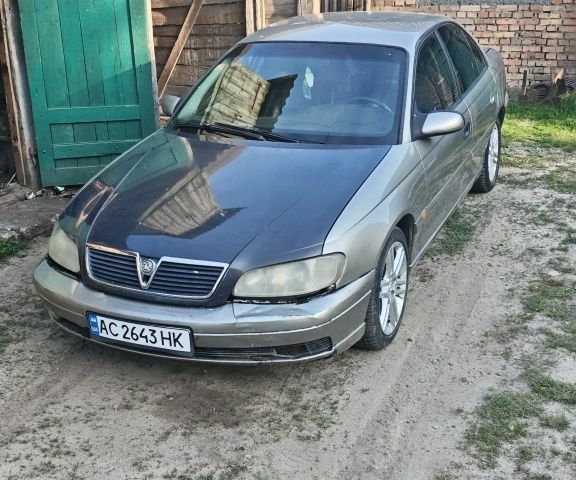 Сірий Опель Омега, об'ємом двигуна 2.5 л та пробігом 174 тис. км за 2357 $, фото 1 на Automoto.ua