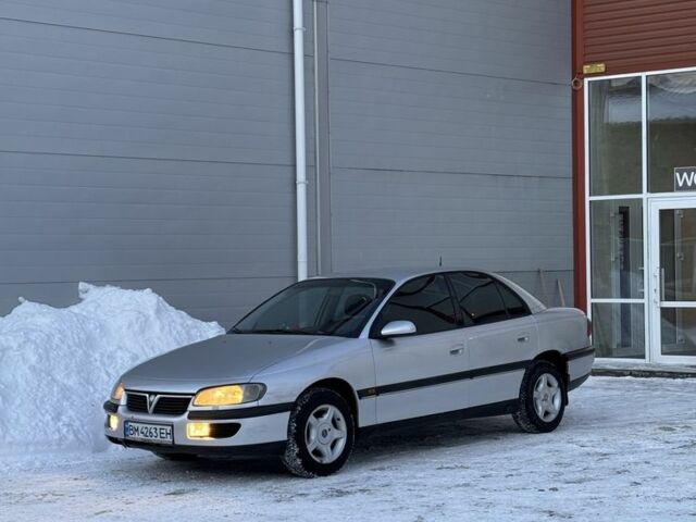 Серый Опель Омега, объемом двигателя 2 л и пробегом 245 тыс. км за 2350 $, фото 1 на Automoto.ua