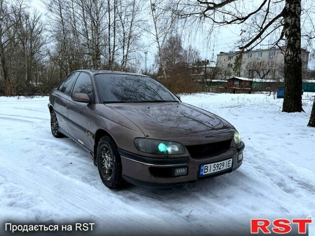Серый Опель Омега, объемом двигателя 3 л и пробегом 240 тыс. км за 1150 $, фото 1 на Automoto.ua