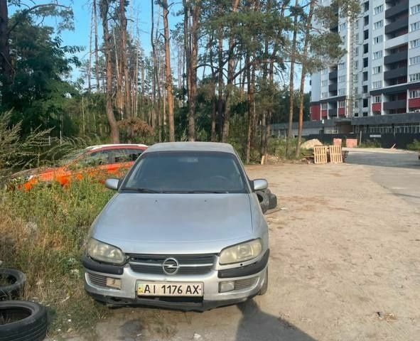 Сірий Опель Омега, об'ємом двигуна 0 л та пробігом 250 тис. км за 851 $, фото 1 на Automoto.ua