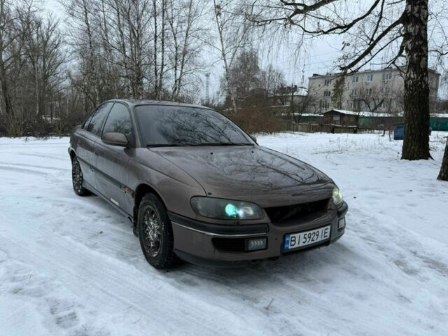 Серый Опель Омега, объемом двигателя 3 л и пробегом 240 тыс. км за 1150 $, фото 1 на Automoto.ua