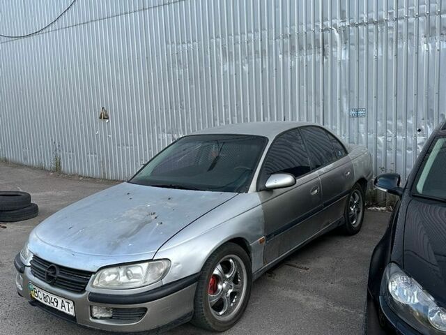 Сірий Опель Омега, об'ємом двигуна 2 л та пробігом 300 тис. км за 750 $, фото 1 на Automoto.ua