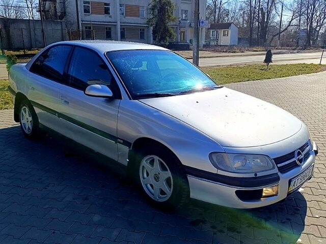 Серый Опель Омега, объемом двигателя 2 л и пробегом 300 тыс. км за 2300 $, фото 1 на Automoto.ua