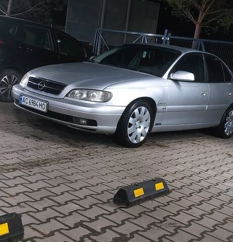 Сірий Опель Омега, об'ємом двигуна 2.5 л та пробігом 330 тис. км за 1400 $, фото 1 на Automoto.ua