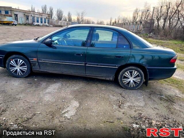 Сірий Опель Омега, об'ємом двигуна 2 л та пробігом 300 тис. км за 1300 $, фото 1 на Automoto.ua