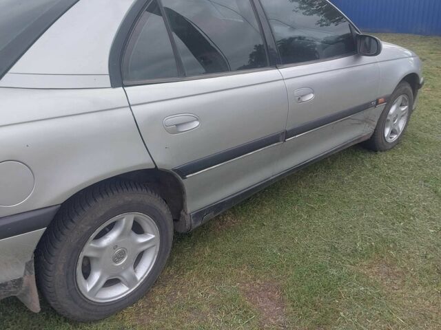 Сірий Опель Омега, об'ємом двигуна 2 л та пробігом 243 тис. км за 2500 $, фото 1 на Automoto.ua