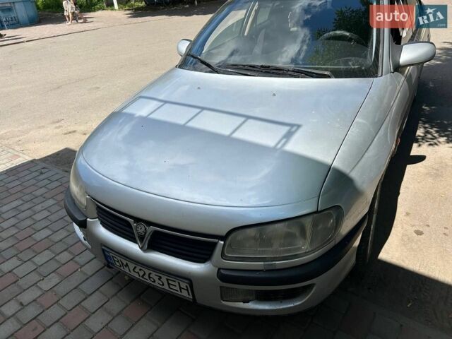 Серый Опель Омега, объемом двигателя 2 л и пробегом 250 тыс. км за 2100 $, фото 1 на Automoto.ua