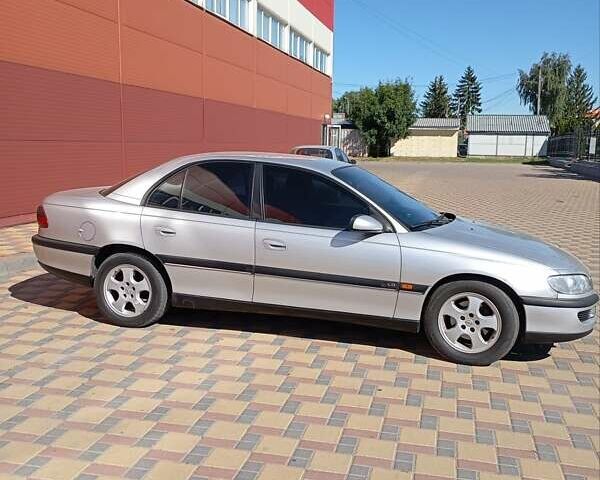 Сірий Опель Омега, об'ємом двигуна 2.5 л та пробігом 165 тис. км за 4000 $, фото 1 на Automoto.ua