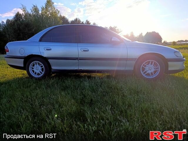Сірий Опель Омега, об'ємом двигуна 2 л та пробігом 262 тис. км за 3000 $, фото 1 на Automoto.ua