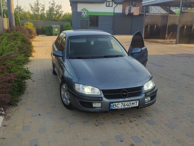 Сірий Опель Омега, об'ємом двигуна 2 л та пробігом 1 тис. км за 1600 $, фото 1 на Automoto.ua