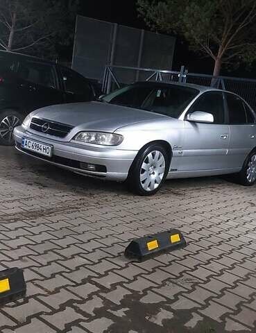 Серый Опель Омега, объемом двигателя 2.5 л и пробегом 330 тыс. км за 1400 $, фото 1 на Automoto.ua