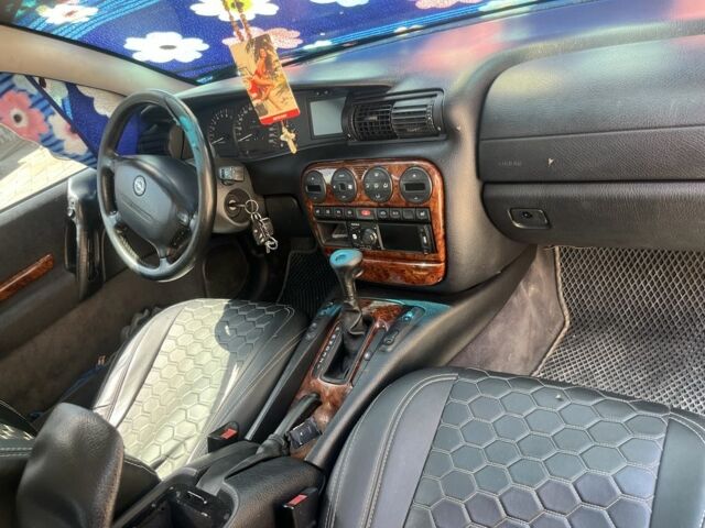 Сірий Опель Омега, об'ємом двигуна 2 л та пробігом 430 тис. км за 800 $, фото 1 на Automoto.ua