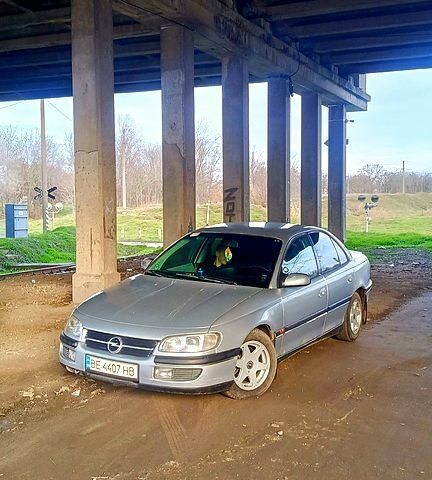 Сірий Опель Омега, об'ємом двигуна 2.5 л та пробігом 290 тис. км за 2000 $, фото 1 на Automoto.ua