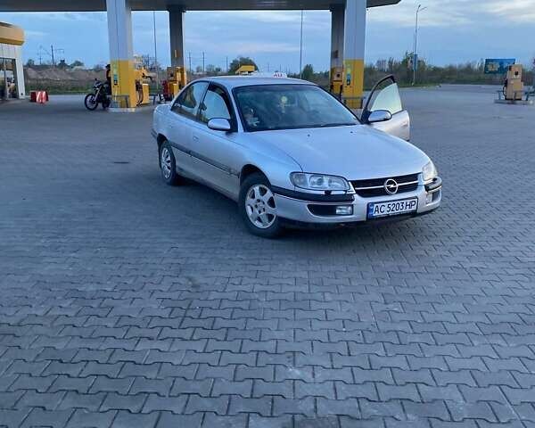Сірий Опель Омега, об'ємом двигуна 2 л та пробігом 500 тис. км за 2000 $, фото 1 на Automoto.ua
