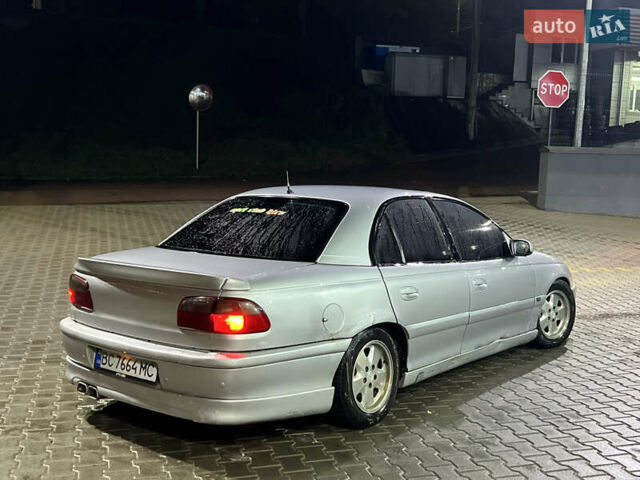 Серый Опель Омега, объемом двигателя 2.5 л и пробегом 250 тыс. км за 1550 $, фото 1 на Automoto.ua