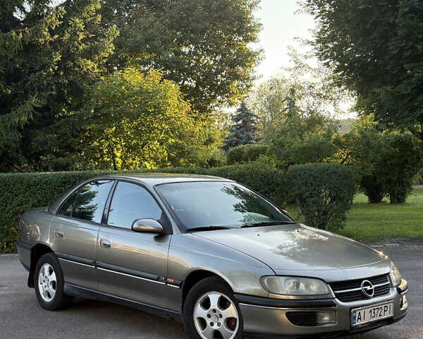 Сірий Опель Омега, об'ємом двигуна 2 л та пробігом 355 тис. км за 2300 $, фото 1 на Automoto.ua