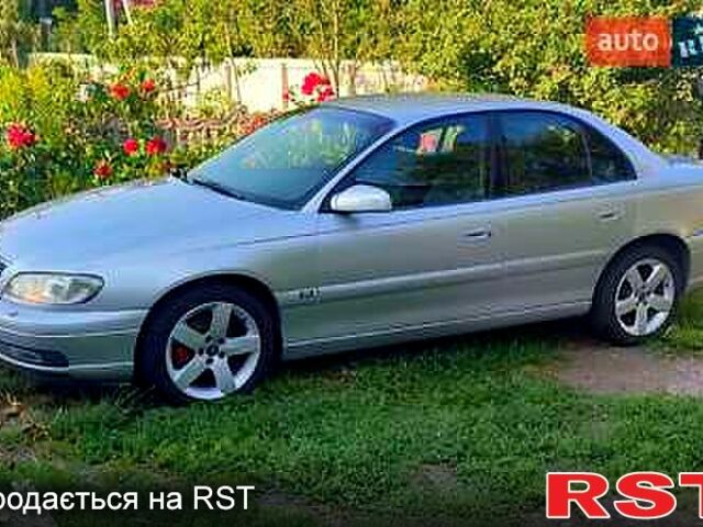 Серый Опель Омега, объемом двигателя 2.5 л и пробегом 280 тыс. км за 3500 $, фото 1 на Automoto.ua