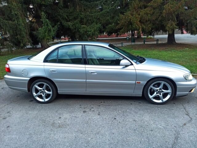 Серый Опель Омега, объемом двигателя 2.2 л и пробегом 250 тыс. км за 4700 $, фото 1 на Automoto.ua