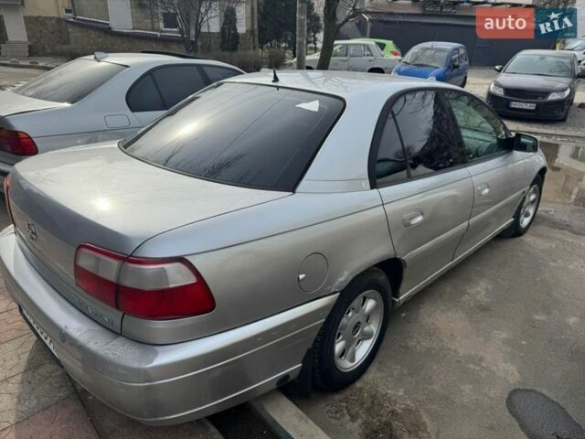 Сірий Опель Омега, об'ємом двигуна 3 л та пробігом 296 тис. км за 2000 $, фото 1 на Automoto.ua