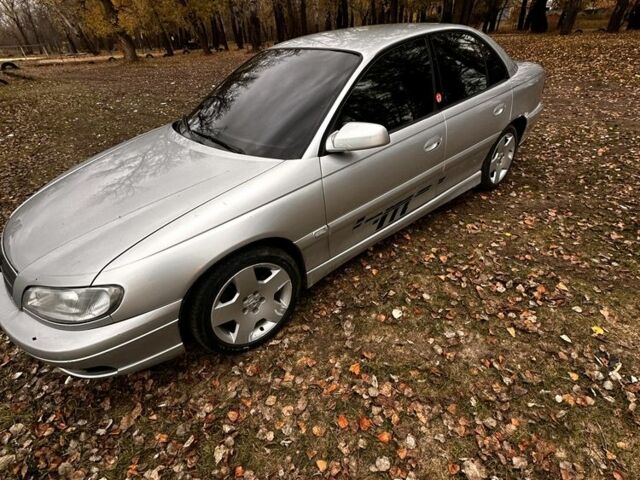 Сірий Опель Омега, об'ємом двигуна 3 л та пробігом 225 тис. км за 1670 $, фото 1 на Automoto.ua