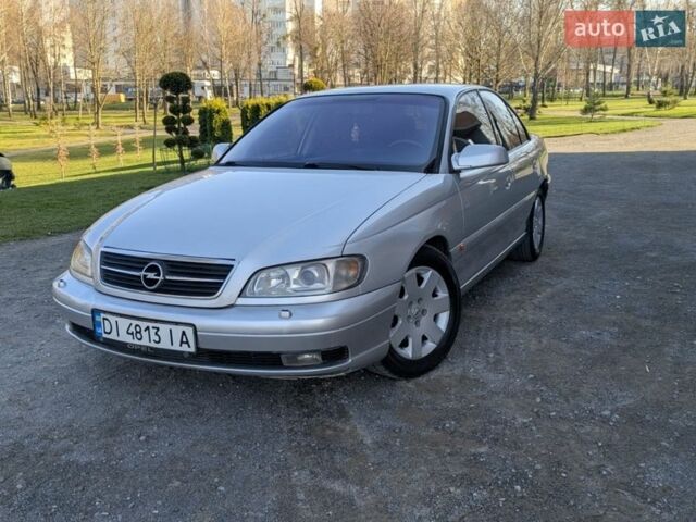Серый Опель Омега, объемом двигателя 2.5 л и пробегом 375 тыс. км за 3450 $, фото 1 на Automoto.ua