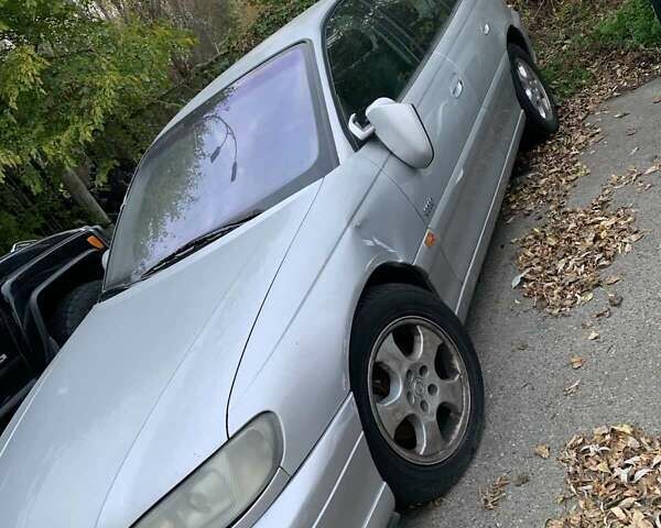 Серый Опель Омега, объемом двигателя 2.2 л и пробегом 245 тыс. км за 1700 $, фото 1 на Automoto.ua