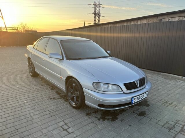 Серый Опель Омега, объемом двигателя 2 л и пробегом 370 тыс. км за 2600 $, фото 1 на Automoto.ua