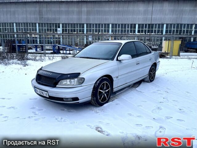 Серый Опель Омега, объемом двигателя 2.2 л и пробегом 300 тыс. км за 1900 $, фото 1 на Automoto.ua