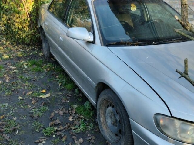 Сірий Опель Омега, об'ємом двигуна 2 л та пробігом 300 тис. км за 800 $, фото 1 на Automoto.ua