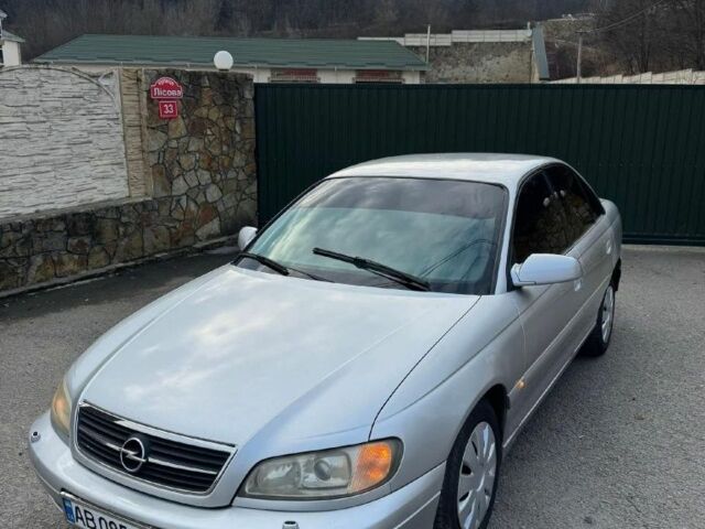 Серый Опель Омега, объемом двигателя 2.2 л и пробегом 223 тыс. км за 1400 $, фото 1 на Automoto.ua