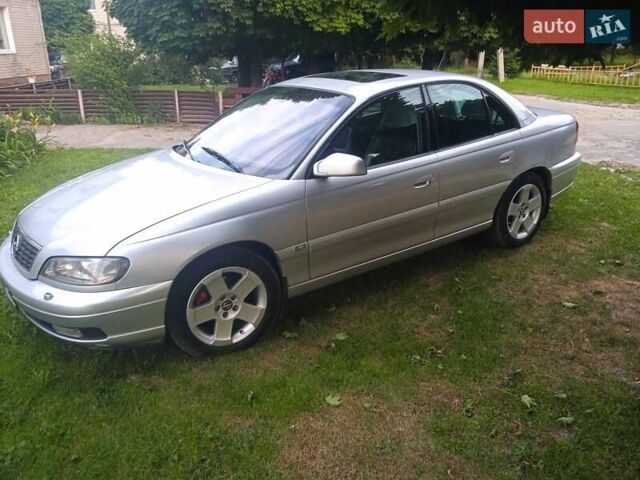 Серый Опель Омега, объемом двигателя 2.5 л и пробегом 263 тыс. км за 4000 $, фото 1 на Automoto.ua