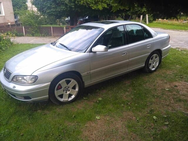 Серый Опель Омега, объемом двигателя 2.5 л и пробегом 263 тыс. км за 4000 $, фото 1 на Automoto.ua