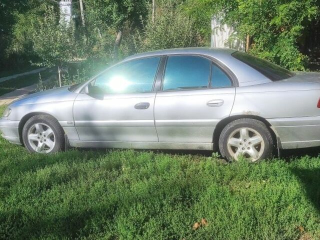 Серый Опель Омега, объемом двигателя 2.2 л и пробегом 356 тыс. км за 3500 $, фото 1 на Automoto.ua