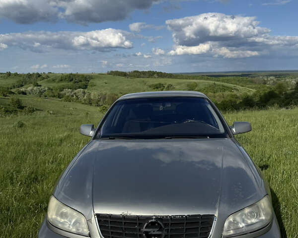 Серый Опель Омега, объемом двигателя 3.2 л и пробегом 350 тыс. км за 3000 $, фото 1 на Automoto.ua