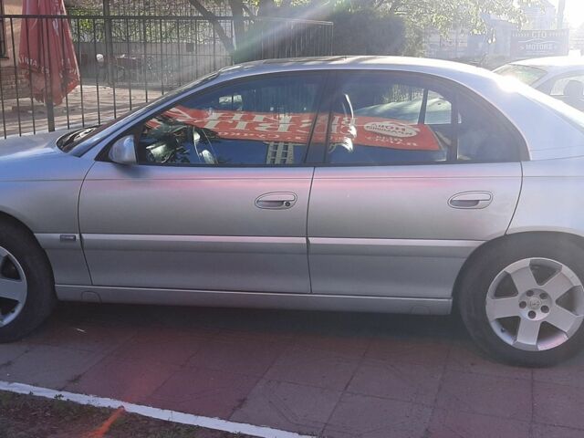 Серый Опель Омега, объемом двигателя 2.2 л и пробегом 260 тыс. км за 4200 $, фото 1 на Automoto.ua