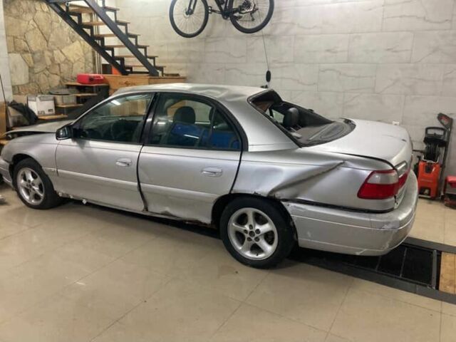 Сірий Опель Омега, об'ємом двигуна 2 л та пробігом 200 тис. км за 1200 $, фото 1 на Automoto.ua