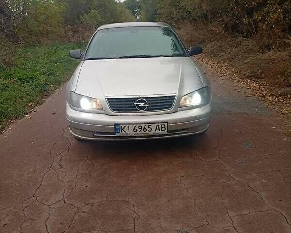 Серый Опель Омега, объемом двигателя 2.2 л и пробегом 331 тыс. км за 1900 $, фото 1 на Automoto.ua