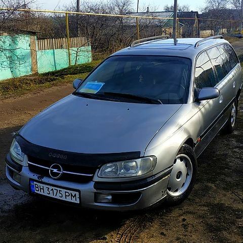 Серый Опель Омега, объемом двигателя 2 л и пробегом 295 тыс. км за 2400 $, фото 1 на Automoto.ua