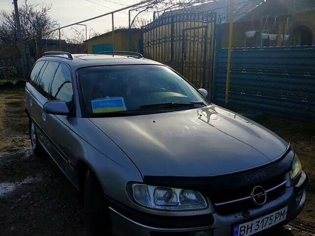 Серый Опель Омега, объемом двигателя 2 л и пробегом 295 тыс. км за 2400 $, фото 1 на Automoto.ua