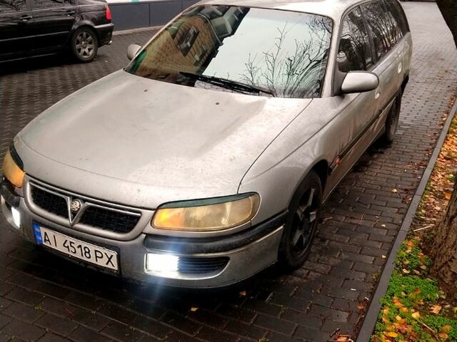 Сірий Опель Омега, об'ємом двигуна 2 л та пробігом 200 тис. км за 1600 $, фото 1 на Automoto.ua