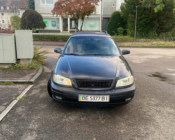 Серый Опель Омега, объемом двигателя 2.5 л и пробегом 450 тыс. км за 3333 $, фото 1 на Automoto.ua