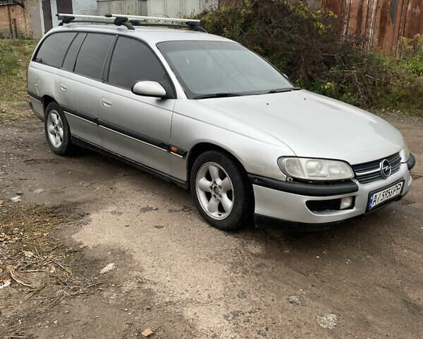 Серый Опель Омега, объемом двигателя 2 л и пробегом 250 тыс. км за 1800 $, фото 1 на Automoto.ua