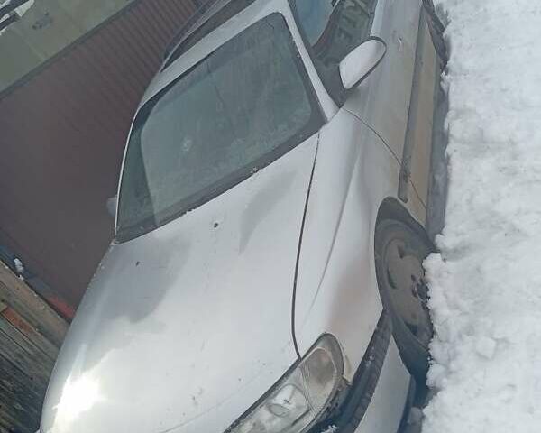 Серый Опель Омега, объемом двигателя 2 л и пробегом 300 тыс. км за 2200 $, фото 1 на Automoto.ua