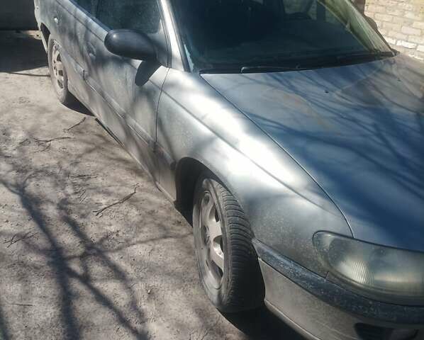 Сірий Опель Омега, об'ємом двигуна 2 л та пробігом 420 тис. км за 1800 $, фото 1 на Automoto.ua