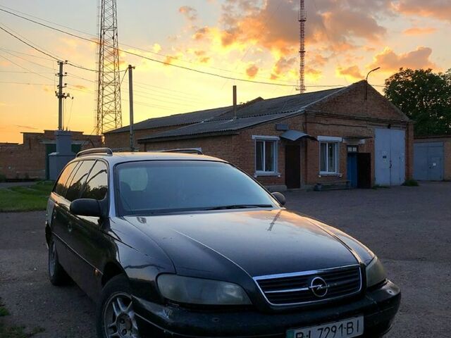 Сірий Опель Омега, об'ємом двигуна 2.5 л та пробігом 111 тис. км за 1800 $, фото 1 на Automoto.ua