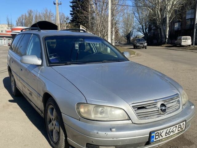 Серый Опель Омега, объемом двигателя 2.5 л и пробегом 200 тыс. км за 1600 $, фото 1 на Automoto.ua